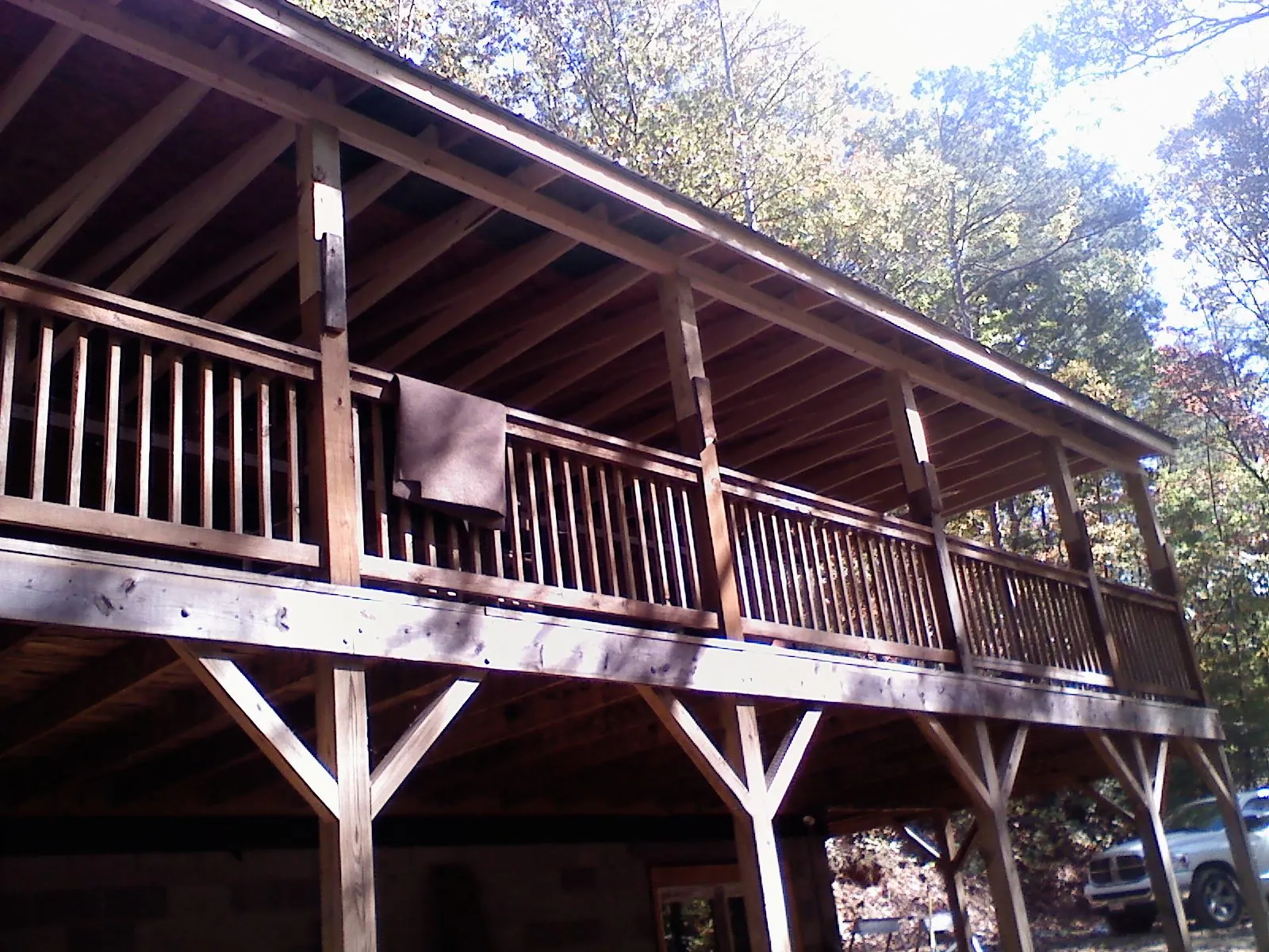 Timber framing under a new elevated porch and deck — Roof Leak Repair in Grayling by Roofing Brothers